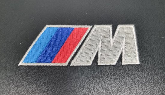 Kinderzitverhoger - Dakota leer, geborduurd logo, zwart, passend voor BMW